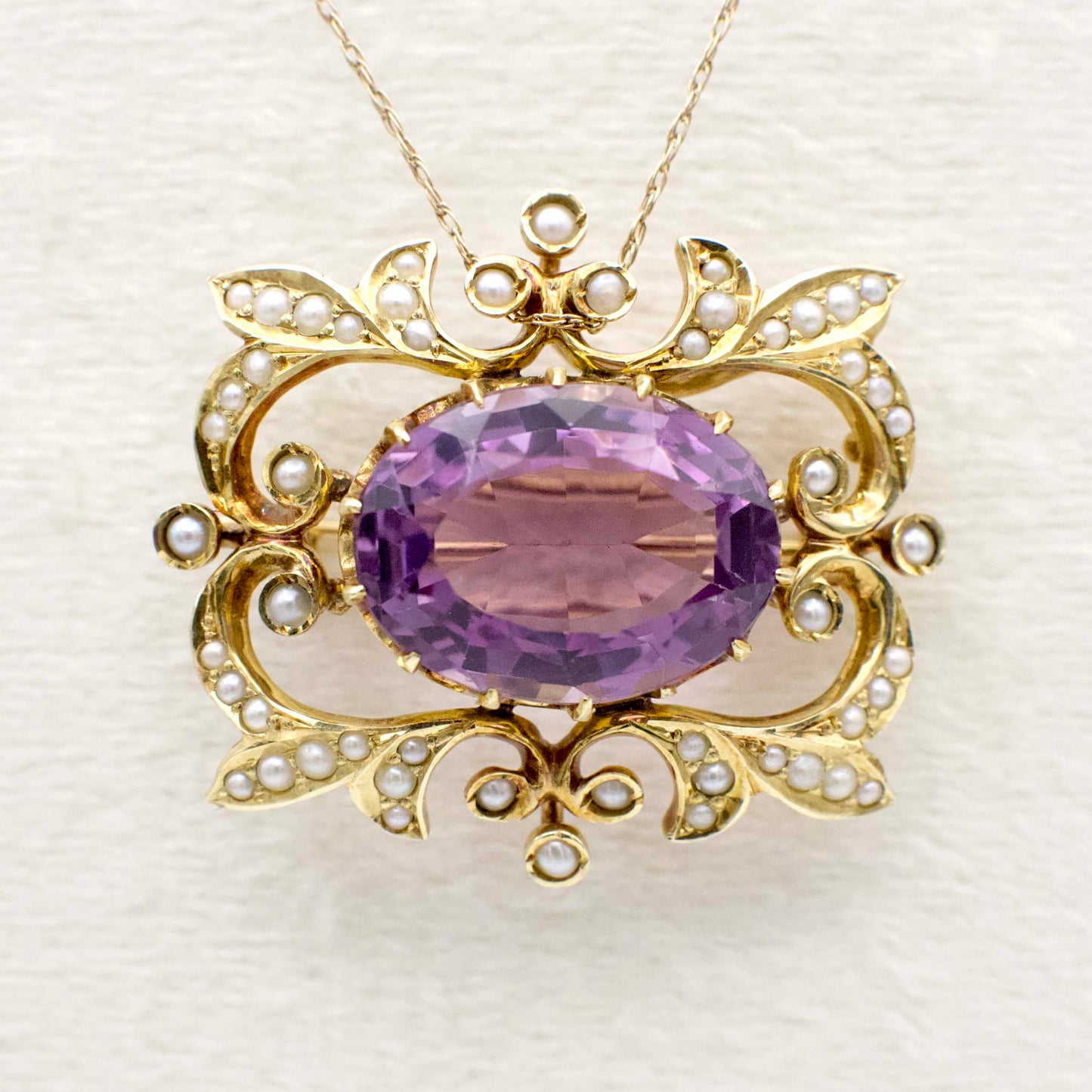 Antique 9.40 Carat Amethyst and Seed Pearl Art Nouveau Watch Pin/Brooch  In 14K Yellow Gold