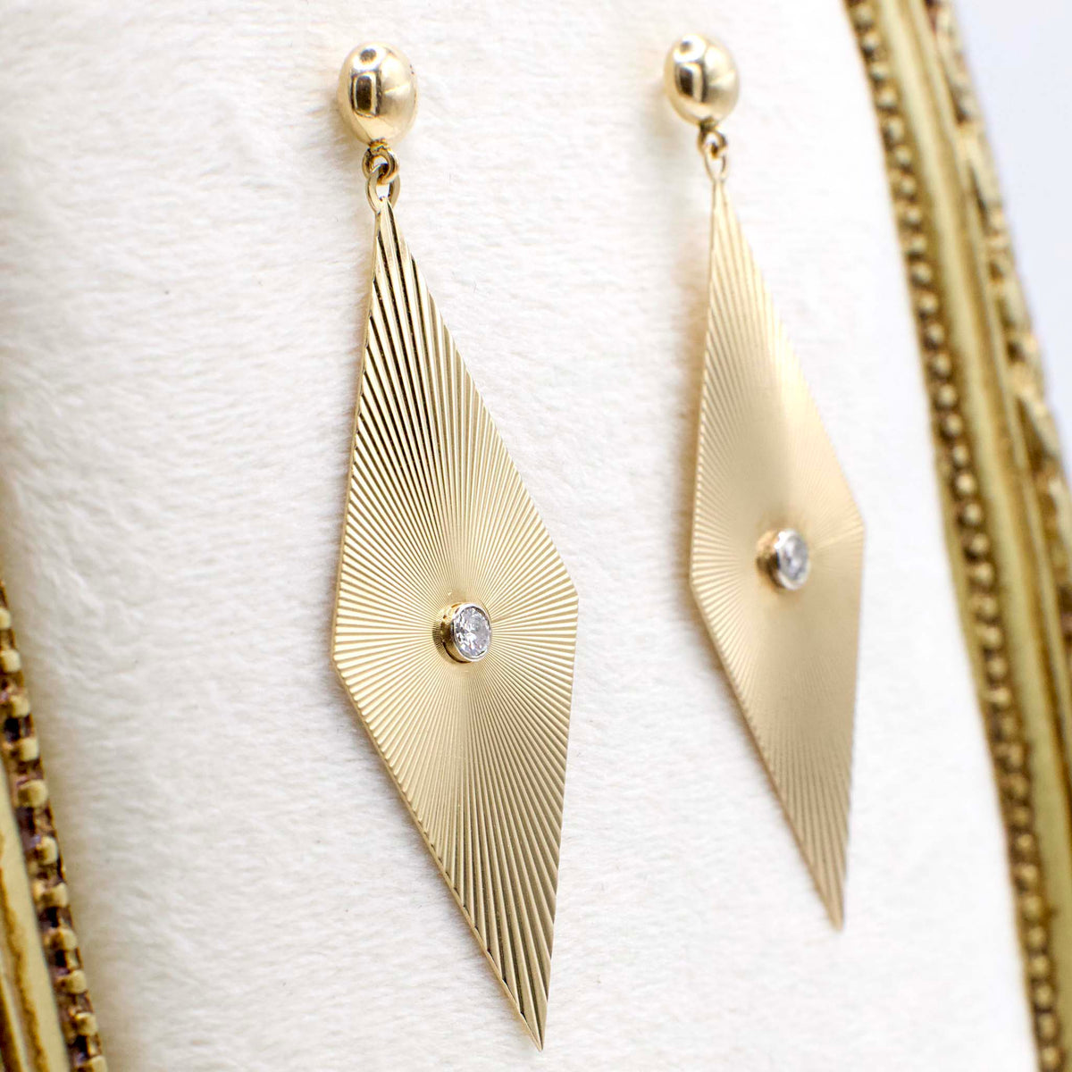Circa 1970 14K Yellow Gold Fluted Ray Rhombus Earrings With Bezel Set Diamond Accents